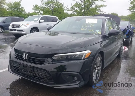 2024 Honda Civic Touring from USA, damaged, VIN 2HGFE1F9XRH324588